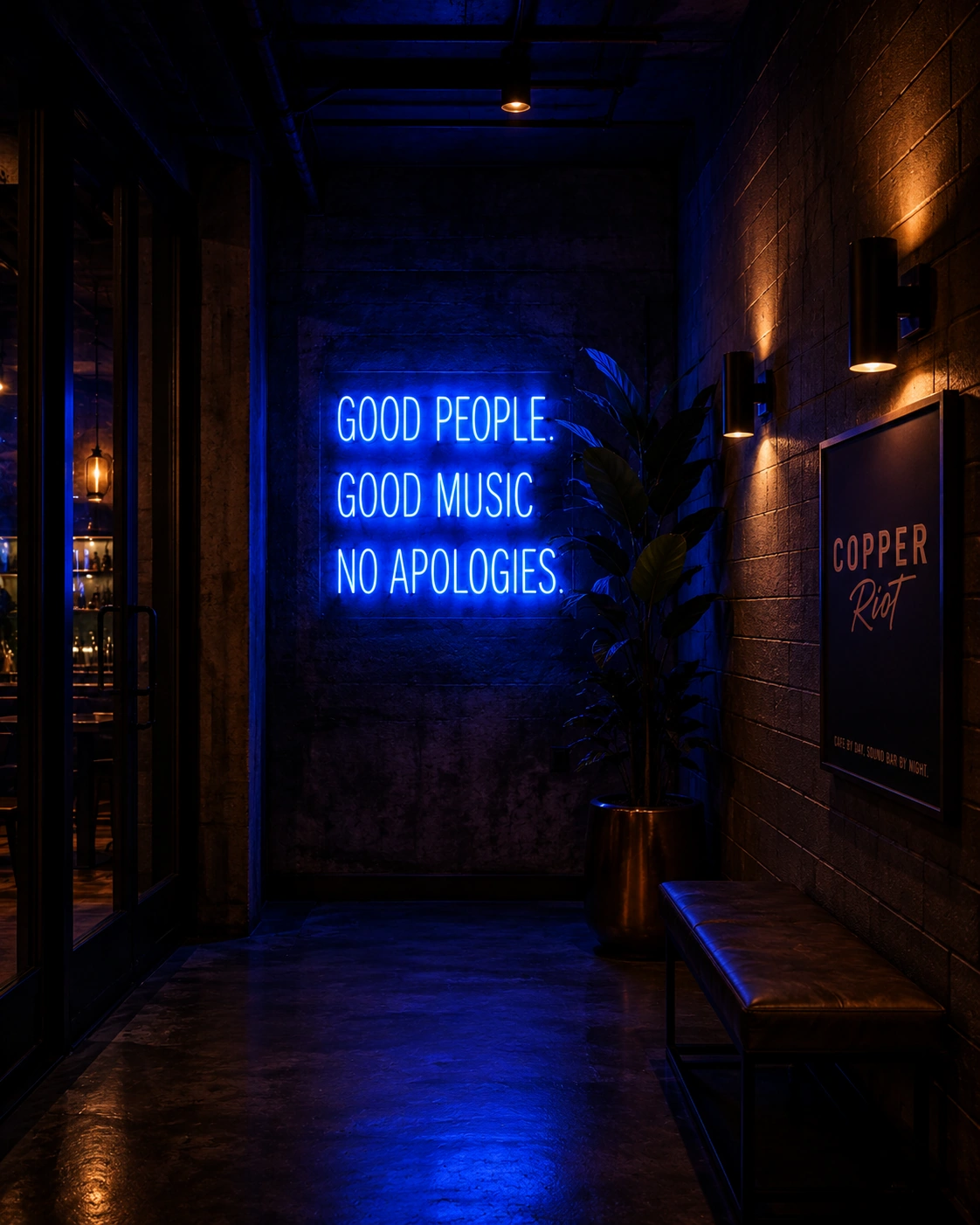 Cobalt-lit Copper Riot hallway with neon brand signage